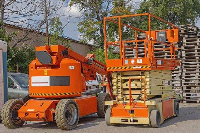 forklift handling inventory in a crowded warehouse environment in Homeland